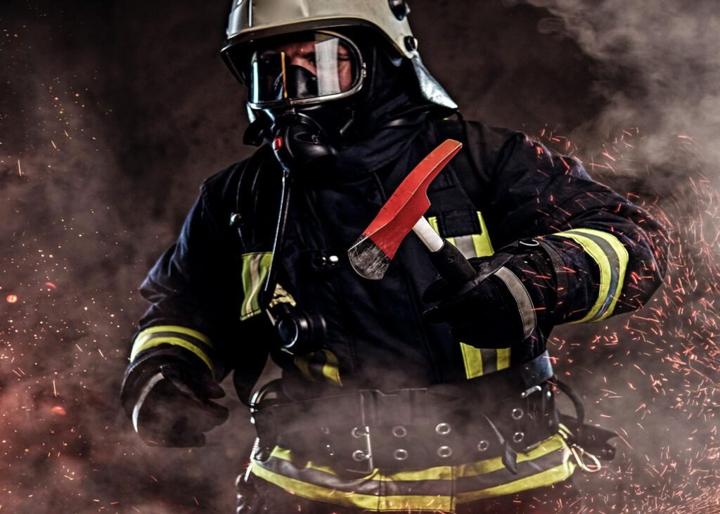 firefighter dressed uniform oxygen mask holds red axe standing fire sparks smoke dark background 1